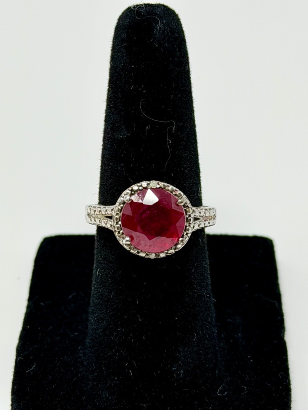 Beautiful Ruby Halo Solitaire Ring